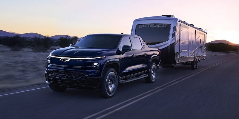 Chevy Silverado EV towing a camper