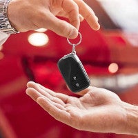 hands exchanging keys